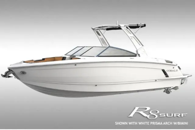 The Image of Cobalt R8 Surf 2026 boat with white Prisma arch and Bimini. - 1