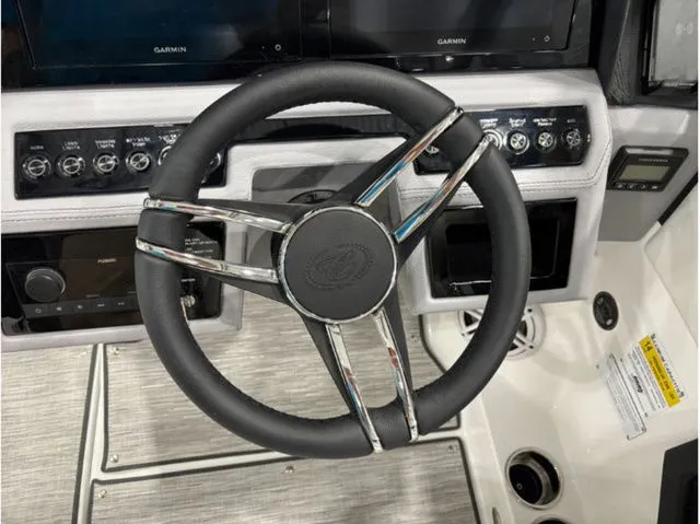 Slide: The Image of 2026 Cobalt R6 steering wheel with modern controls. - 9