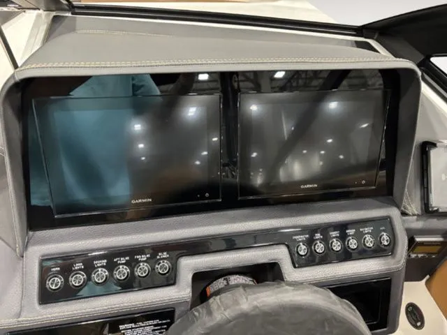 Slide: The Image of Dashboard of 2026 Cobalt R4 featuring Garmin screens. - 12