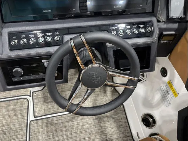 Slide: The Image of 2026 Cobalt R4 steering wheel with modern controls. - 13
