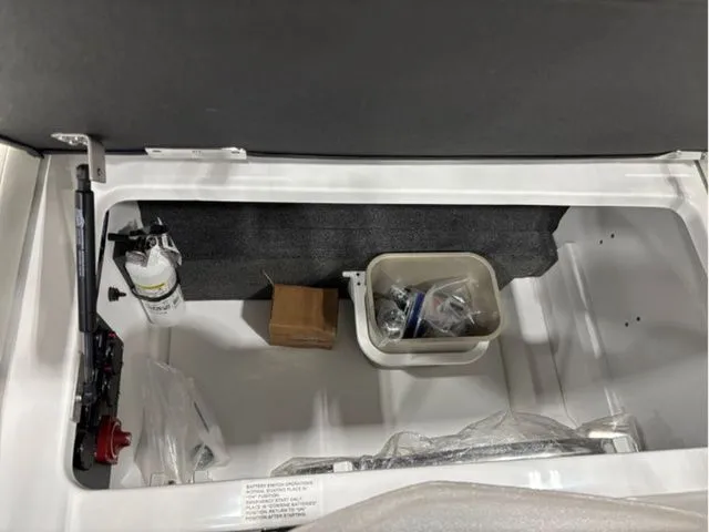 Slide: The Image of Storage compartment in Cobalt R6 boat, model year 2026. - 14