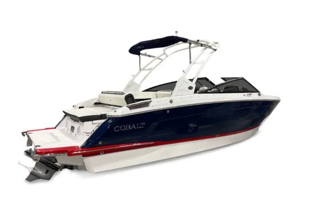 Slide: The Image of 2026 Cobalt R6 boat with blue hull and red accent. - 6