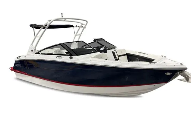 Slide: The Image of 2026 Cobalt R6 boat, sleek design, blue and white with red accent. - 7