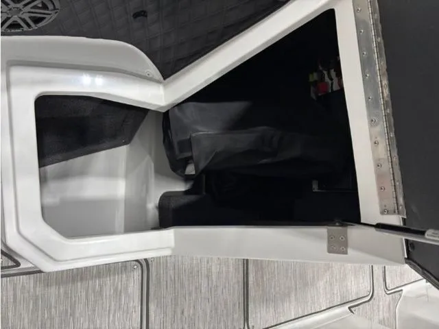 Slide: The Image of Interior of 2026 Cobalt R6 boat, storage compartment view. - 9