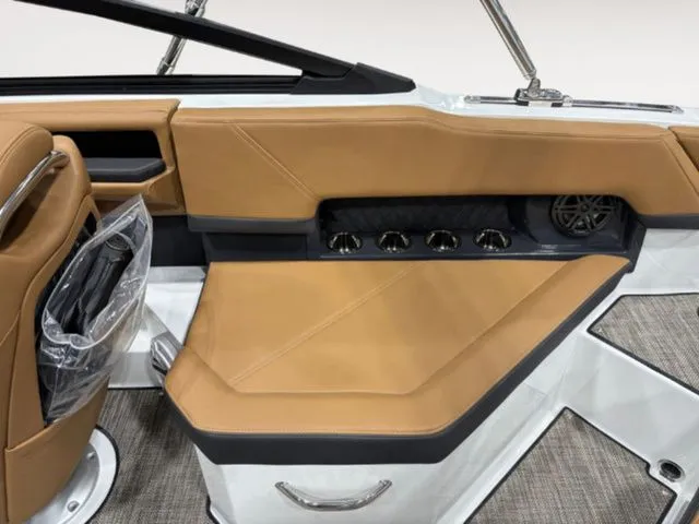 Slide: The Image of Interior of a 2026 Cobalt R4 boat with brown leather seating. - 10