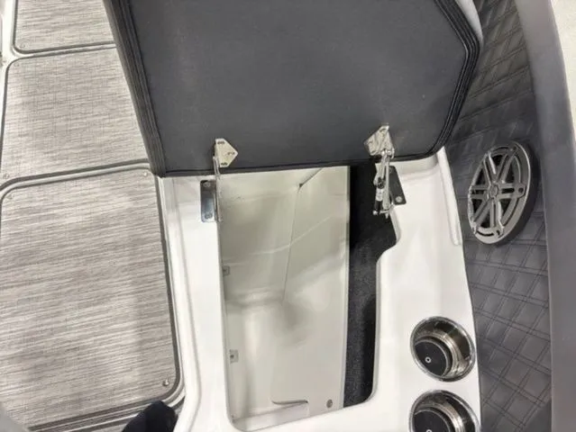 Slide: The Image of Interior of 2026 Cobalt R6 with storage compartment and speaker. - 13