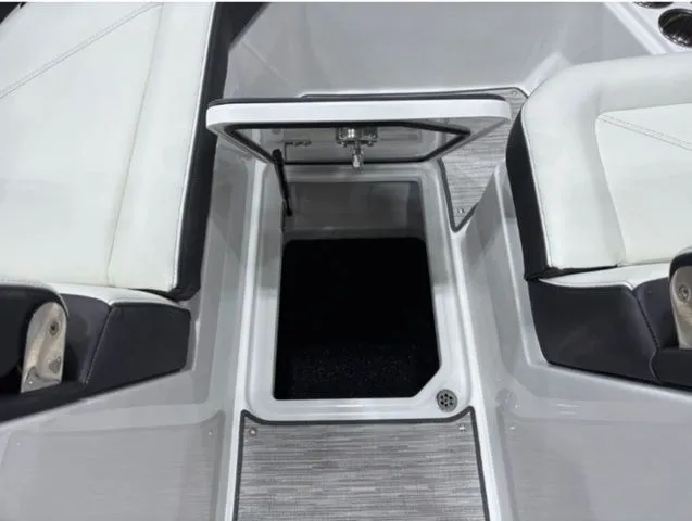 Slide: The Image of Interior of 2026 Cobalt R6 boat featuring storage compartment. - 14