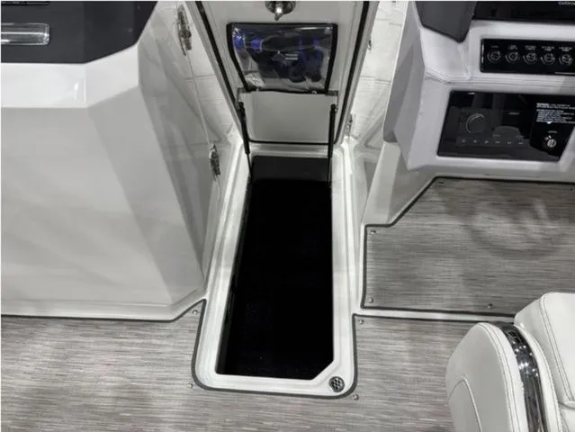 Slide: The Image of Interior of 2026 Cobalt R6 with storage compartment and controls. - 15