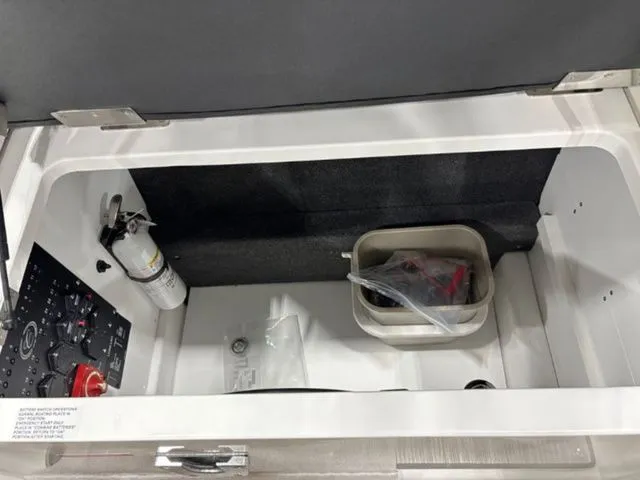 Slide: The Image of Interior of 2026 Cobalt R6 with storage compartment and fire extinguisher. - 17