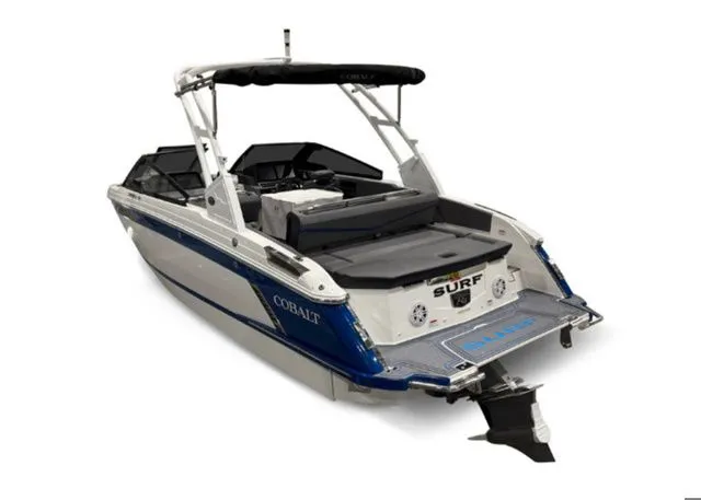 Slide: The Image of 2026 Cobalt R4 Surf boat, blue and white, rear view. - 3