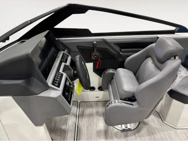 Slide: The Image of Interior of 2026 Cobalt R4 Surf with gray seat and control console. - 7