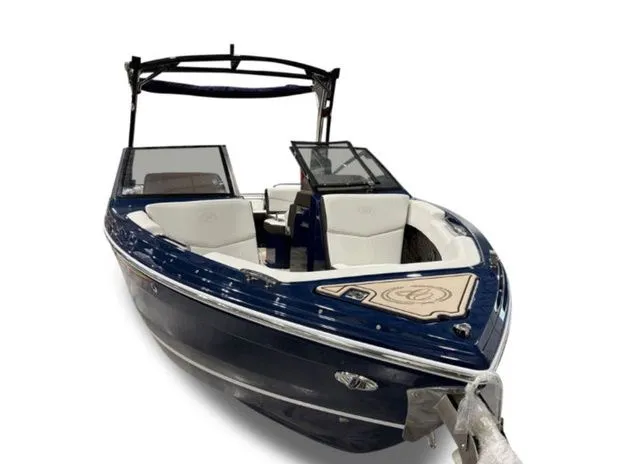 Slide: The Image of 2026 Cobalt R4 Surf boat with sleek design and luxurious interior. - 7