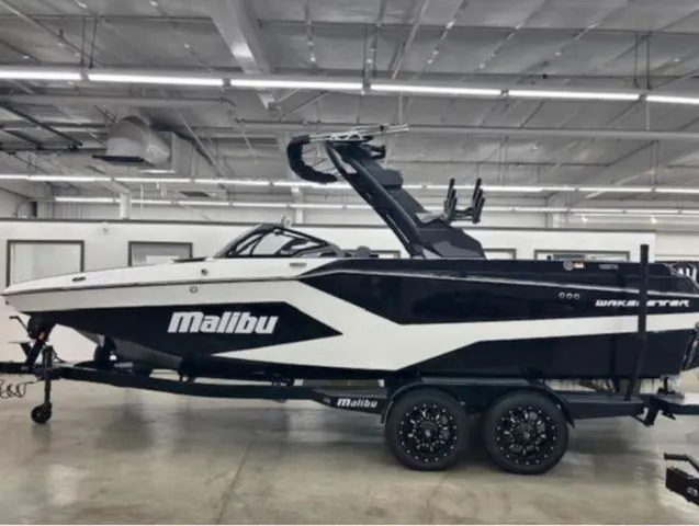 The Image of 2026 Malibu Wakesetter 23 MXZ boat in a warehouse. - 1