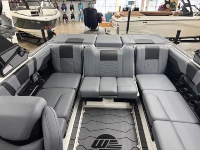 Slide: The Image of Interior of 2026 Malibu Wakesetter 23 MXZ with gray seating. - 8