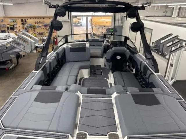 Slide: The Image of Interior of 2026 Malibu Wakesetter 23 MXZ with gray seating. - 9