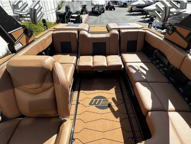 Slide: The Image of Interior of 2026 Malibu Wakesetter 23 MXZ with luxurious leather seating. - 11
