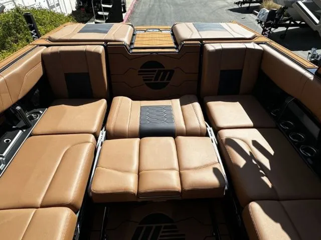 Slide: The Image of Interior of 2026 Malibu Wakesetter 23 MXZ with luxurious leather seating. - 12