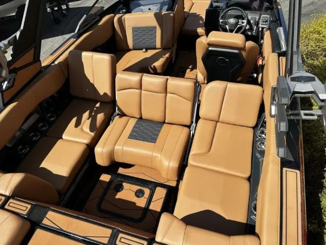 Slide: The Image of Interior of 2026 Malibu Wakesetter 23 MXZ with luxurious leather seating. - 13