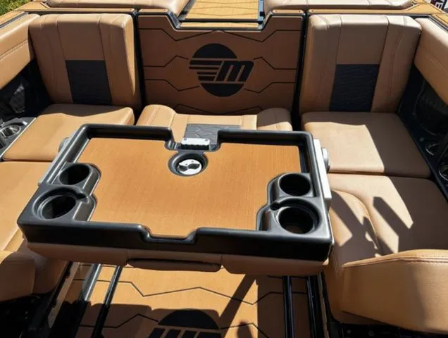 Slide: The Image of Interior of 2026 Malibu Wakesetter 23 MXZ with table and seating. - 14