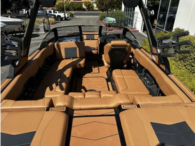 Slide: The Image of Interior of 2026 Malibu Wakesetter 23 MXZ with luxurious leather seating. - 5