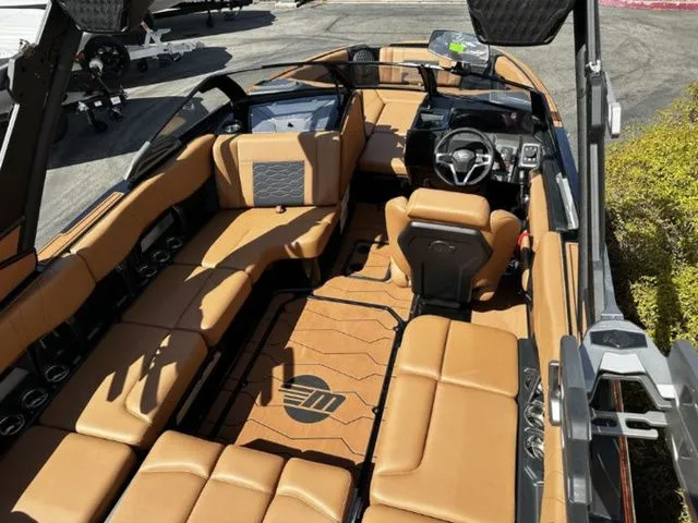 Slide: The Image of Interior of 2026 Malibu Wakesetter 23 MXZ with luxurious leather seating. - 6
