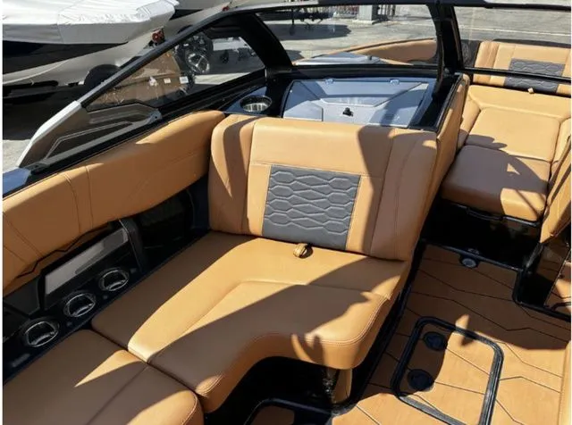 Slide: The Image of Interior of 2026 Malibu Wakesetter 23 MXZ with luxurious leather seating. - 7