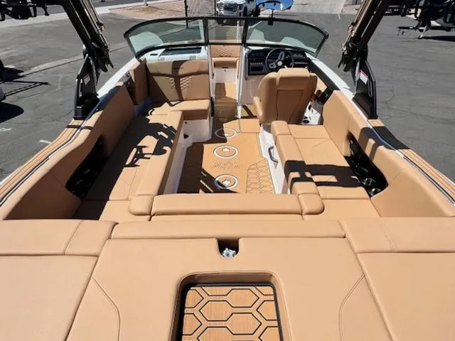 Slide: The Image of Interior of a 2026 MasterCraft NXT22 boat with luxurious leather seating. - 12