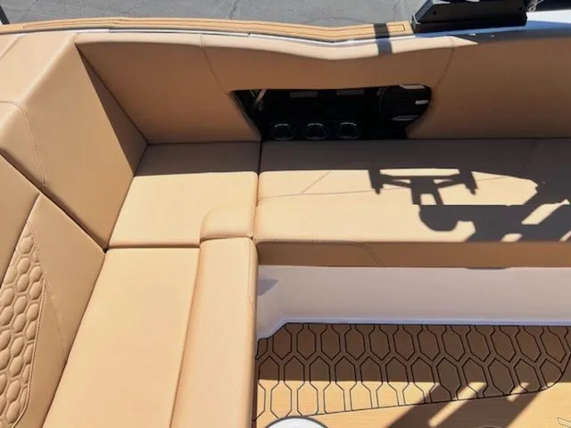 Slide: The Image of 2026 MasterCraft NXT22 interior with beige upholstery. - 15