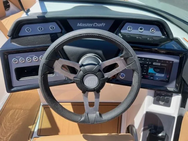 Slide: The Image of Steering wheel and dashboard of 2026 MasterCraft NXT22 boat. - 20