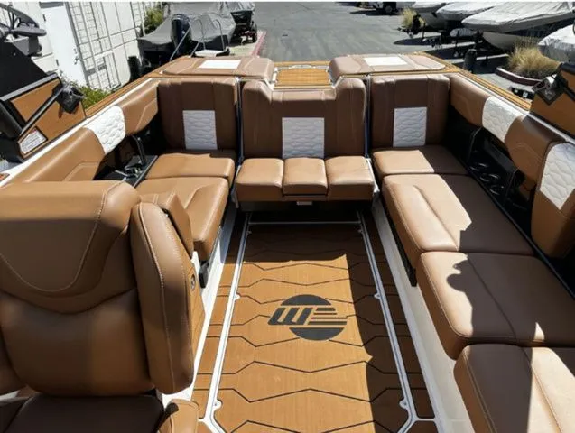 Slide: The Image of Interior of 2026 Malibu Wakesetter 24 MXZ with luxurious leather seating. - 10