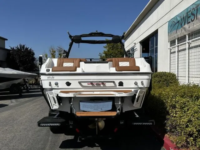 Slide: The Image of Rear view of 2026 Malibu Wakesetter 24 MXZ boat outdoors. - 4