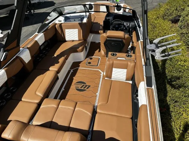 Slide: The Image of Interior of 2026 Malibu Wakesetter 24 MXZ with luxurious leather seating. - 5