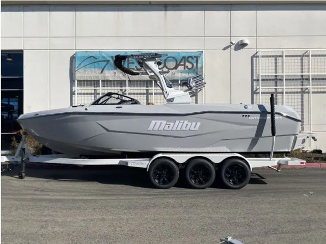 The Image of 2026 Malibu Wakesetter 25 LSV boat on trailer, side view. - 1
