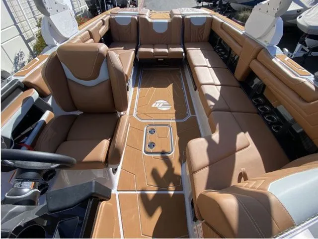 Slide: The Image of Interior of 2026 Malibu Wakesetter 25 LSV with luxurious leather seating. - 10