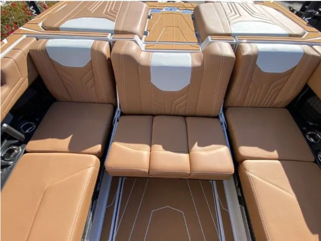 Slide: The Image of 2026 Malibu Wakesetter 25 LSV interior with luxurious leather seating. - 13