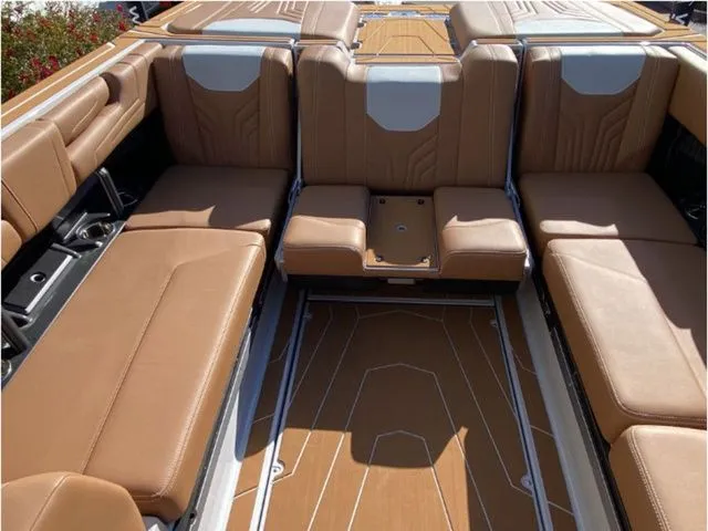 Slide: The Image of 2026 Malibu Wakesetter 25 LSV interior with tan seating. - 16