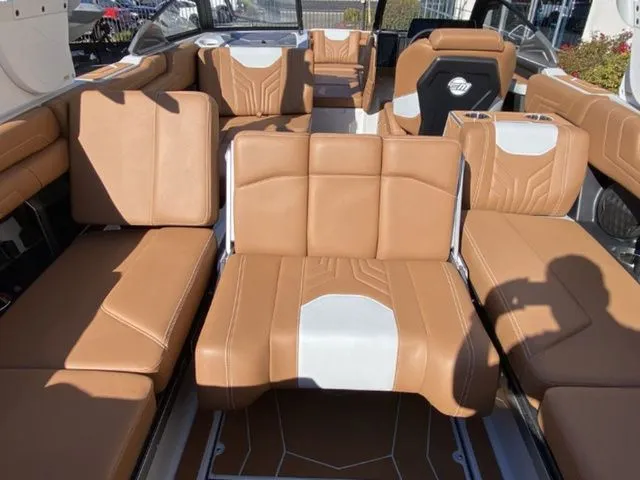 Slide: The Image of Interior of 2026 Malibu Wakesetter 25 LSV with luxurious leather seating. - 18