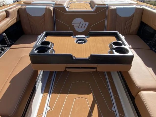 Slide: The Image of 2026 Malibu Wakesetter 25 LSV interior with table and seating. - 19