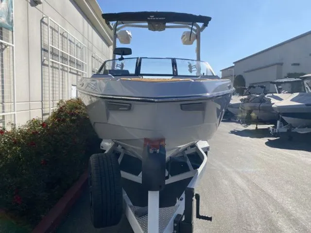 Slide: The Image of 2026 Malibu Wakesetter 25 LSV boat on trailer, front view. - 6