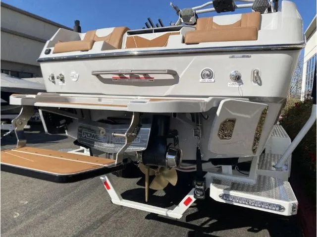 Slide: The Image of Rear view of 2026 Malibu Wakesetter 25 LSV with luxurious interior. - 8