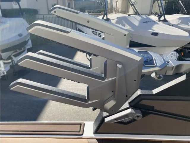 Slide: The Image of 2026 Malibu Wakesetter 23 MXZ boat detail view with modern features. - 20
