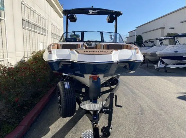 Slide: The Image of 2026 Malibu Wakesetter 23 MXZ boat on trailer, front view. - 5