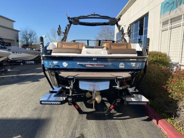 Slide: The Image of Rear view of 2026 Malibu Wakesetter 23 MXZ on a parking lot. - 6