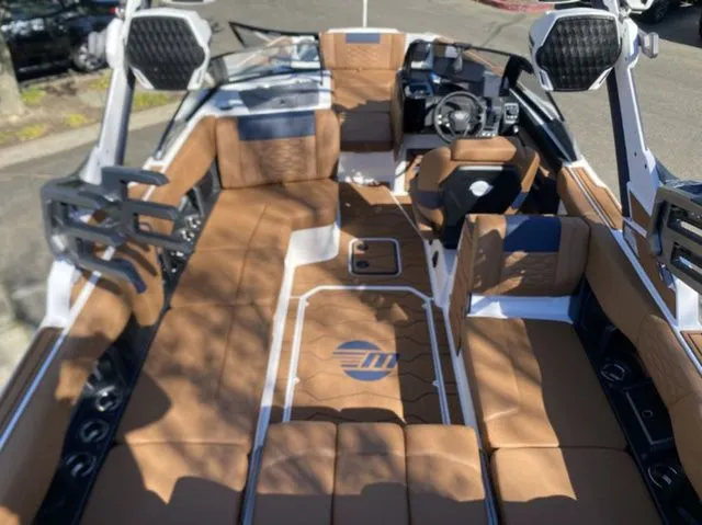 Slide: The Image of Interior of 2026 Malibu Wakesetter 24 MXZ with luxurious leather seating. - 7