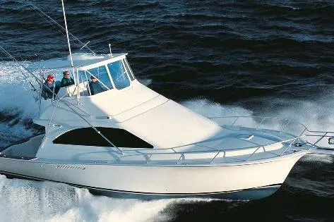 The Image of 2009 Ocean Yachts 42 Super Sport cruising on open water. - 0