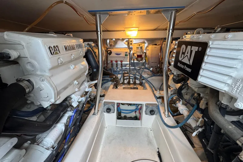 Slide: The Image of Engine room of 2009 Ocean Yachts 42 Super Sport with CAT Marine Power engines. - 12