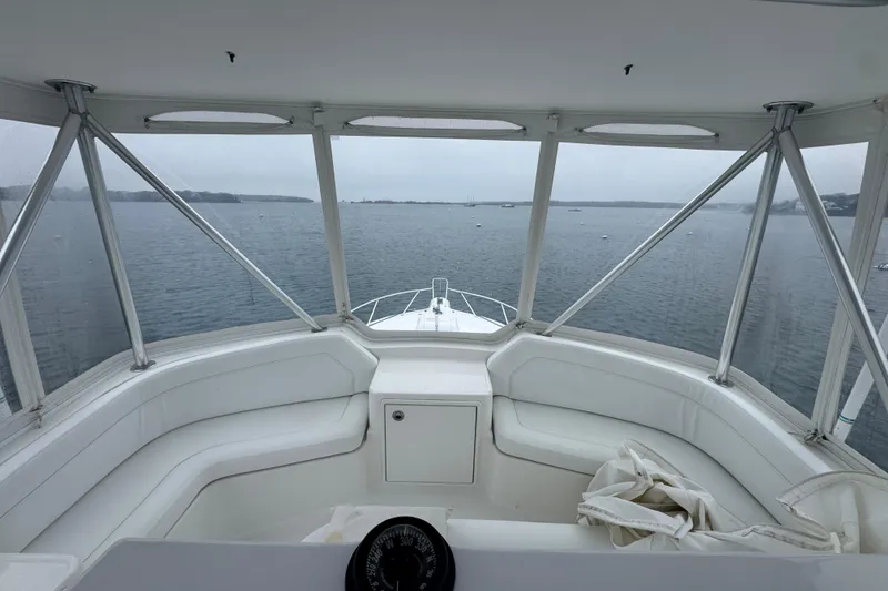 Slide: The Image of Interior view of 2009 Ocean Yachts 42 Super Sport, overlooking calm waters. - 16