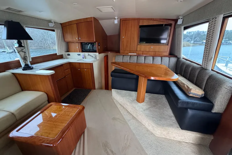 Slide: The Image of Luxurious interior of 2009 Ocean Yachts 42 Super Sport with elegant wood finishes. - 3