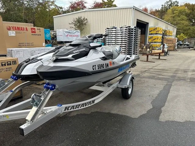 Slide: The Image of 2021 Sea-Doo GTX on Karavan trailer outside warehouse. - 3