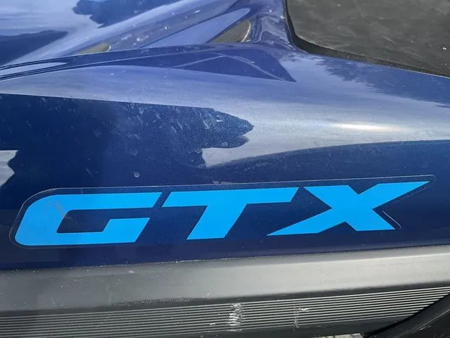 Slide: The Image of Close-up of blue 2024 Sea-Doo GTX jet ski. - 10